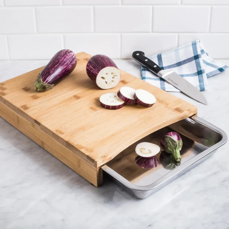 Bamboo cutting board with pull-out steel tray