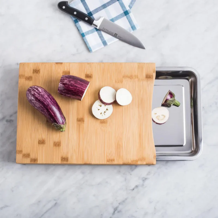 Bamboo cutting board with pull-out steel tray